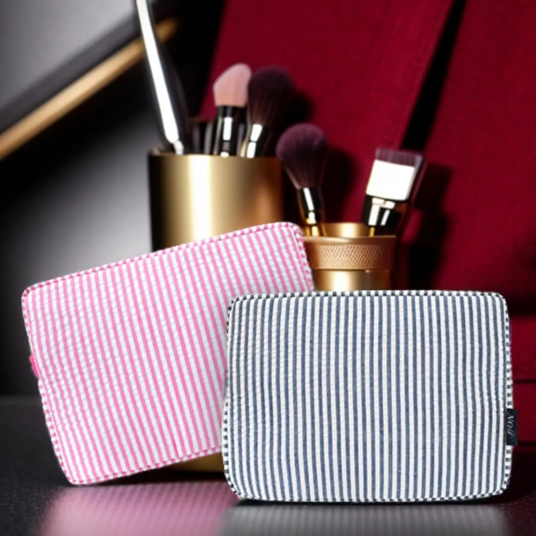 NGIL Makeup Bag for Women, Cute Cosmetic Bag, Travel Toiletry Make up Bag, Seersucker Aesthetic Organizer Storage Pouch for Women and Moms Gifts (Seesucker- Navy)